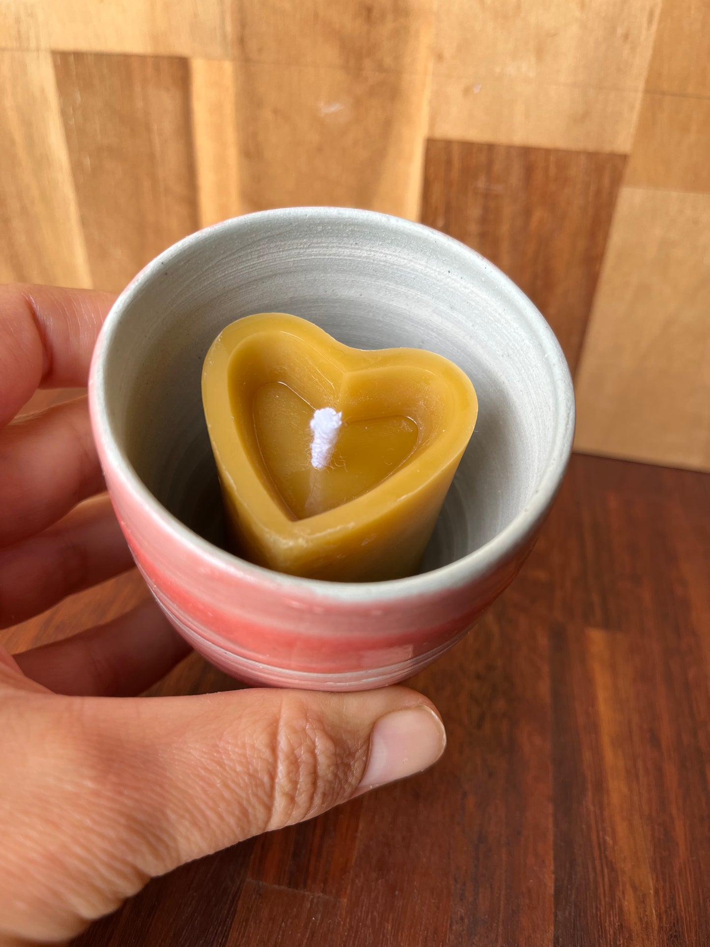Beeswax heart shaped candle with ceramic holder pink/red